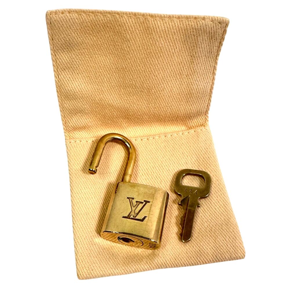 Louis Vuitton Lock & Matching Key #334 with Dust Bag